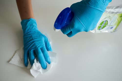 tissue and cleaning fluid are used to clean dirty objects