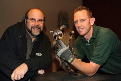 jeremy clicking photo with Raccoon